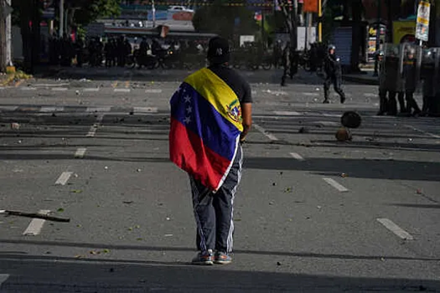 In Venezuela, protesters tore down a statue of Hugo Chavez