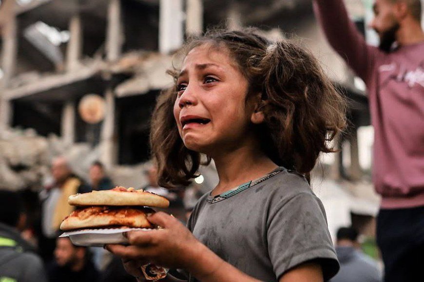 Girl Cries After Receiving Food in Gaza