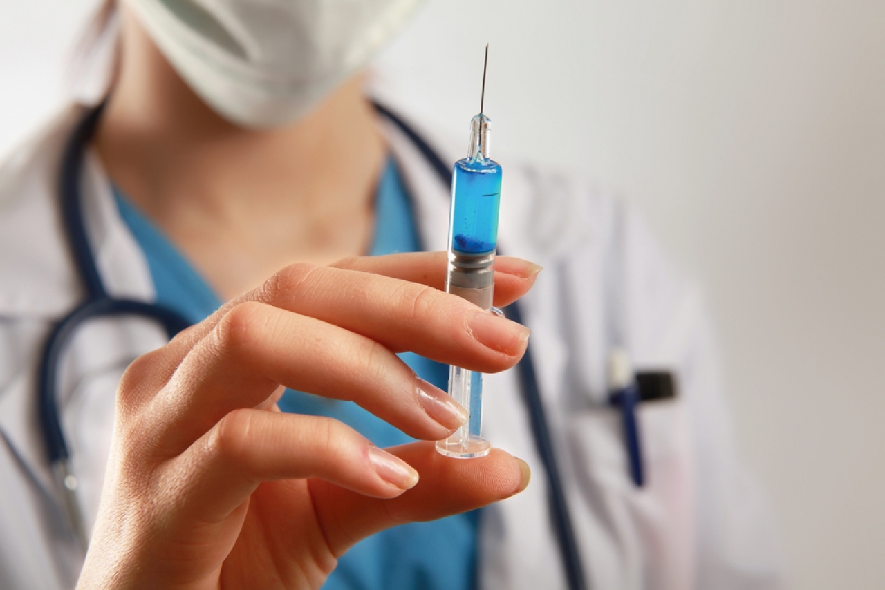 Analysing the impact of childhood vaccines: lack of benefit and presence of side effects